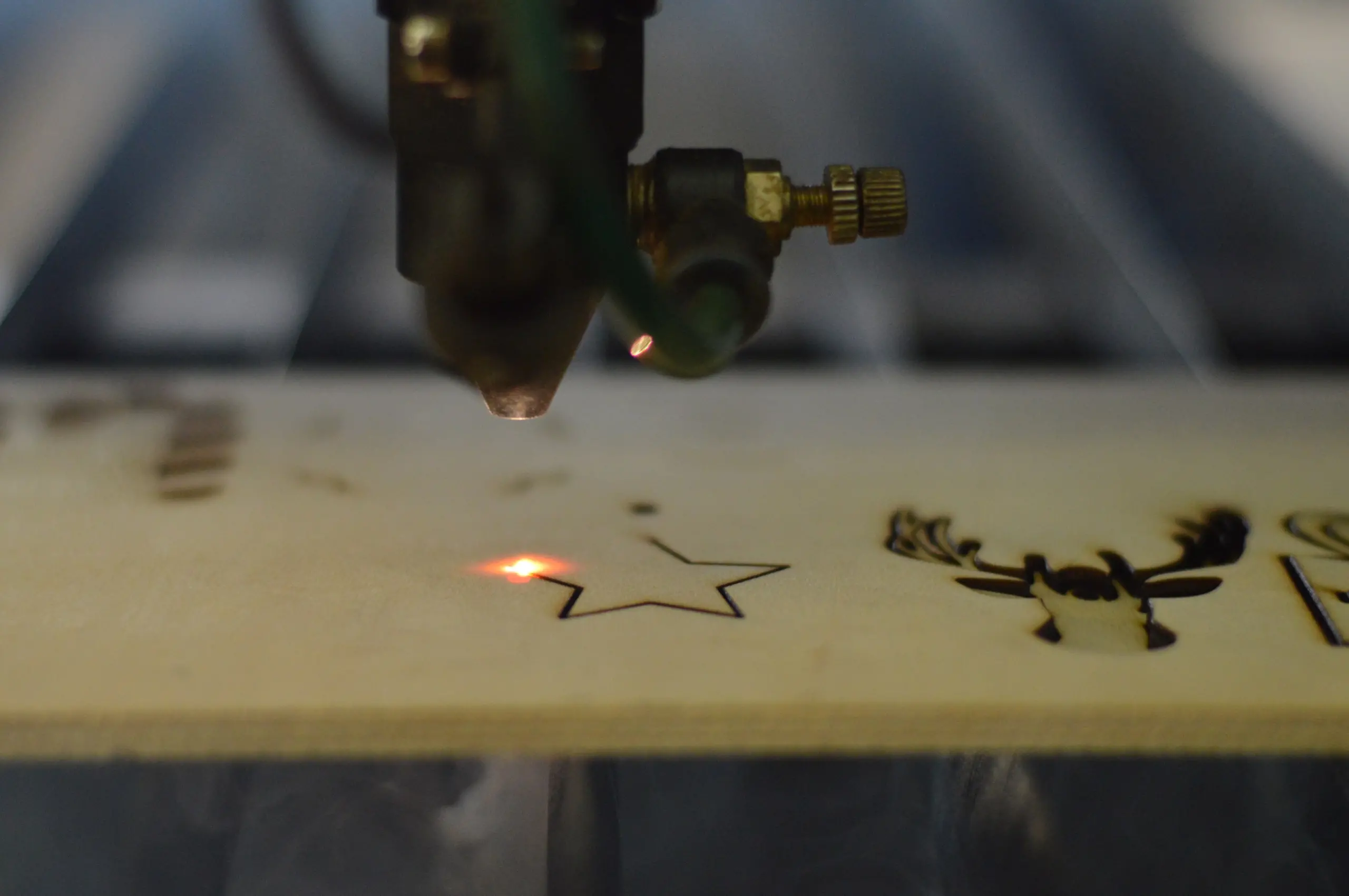 Photo of a star being cut into a piece of wood